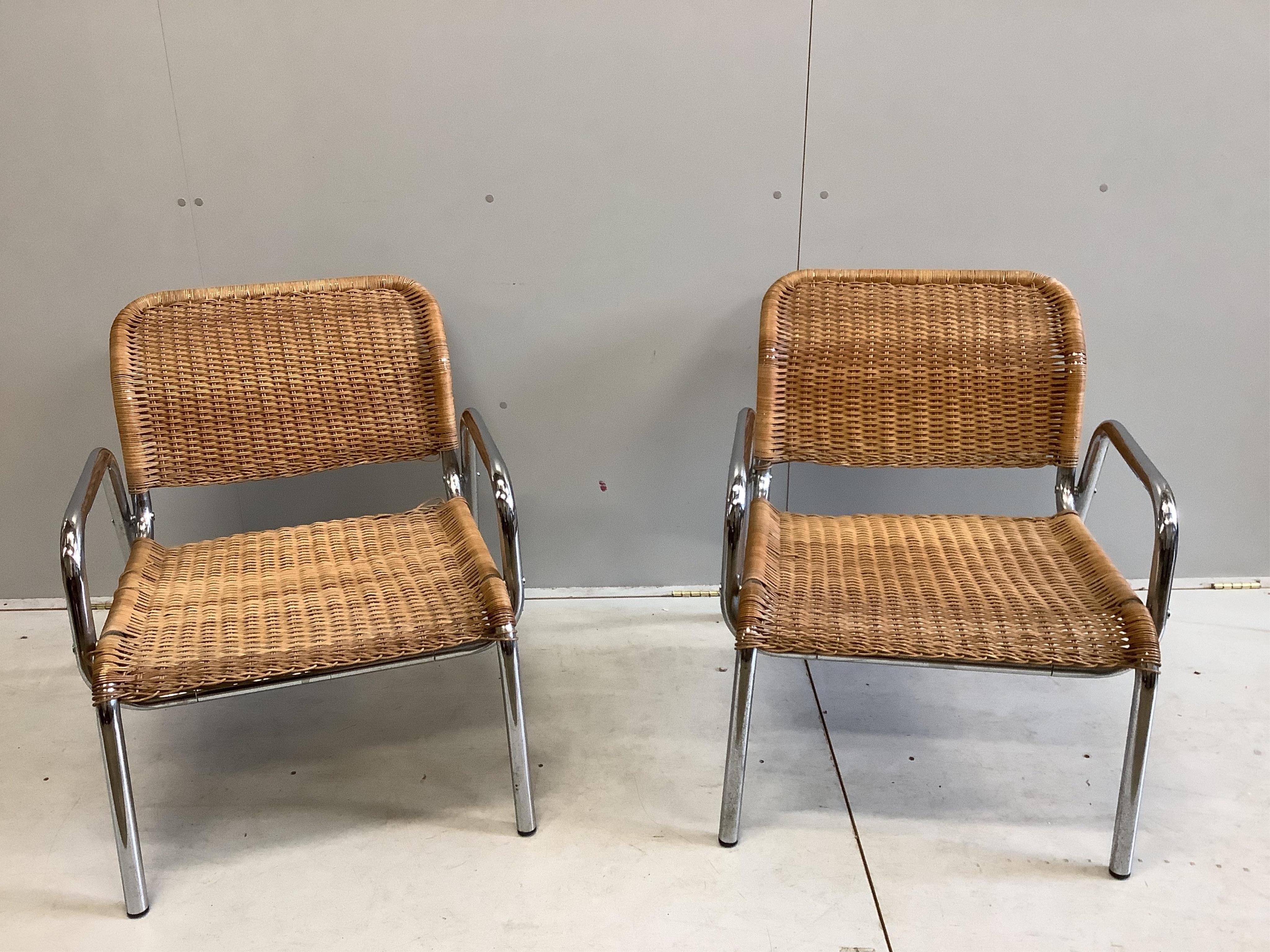 A pair of modern cane garden chairs, width 66cm, depth 56cm, height 78cm. Condition - fair